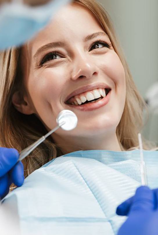 Patient smiles at dentist