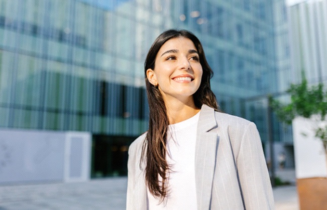 Young professional woman smiling with confidence