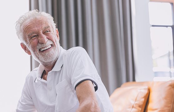 Patient in Renton smiling with dentures