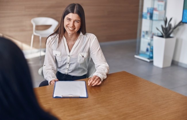 Dental patient filling out forms